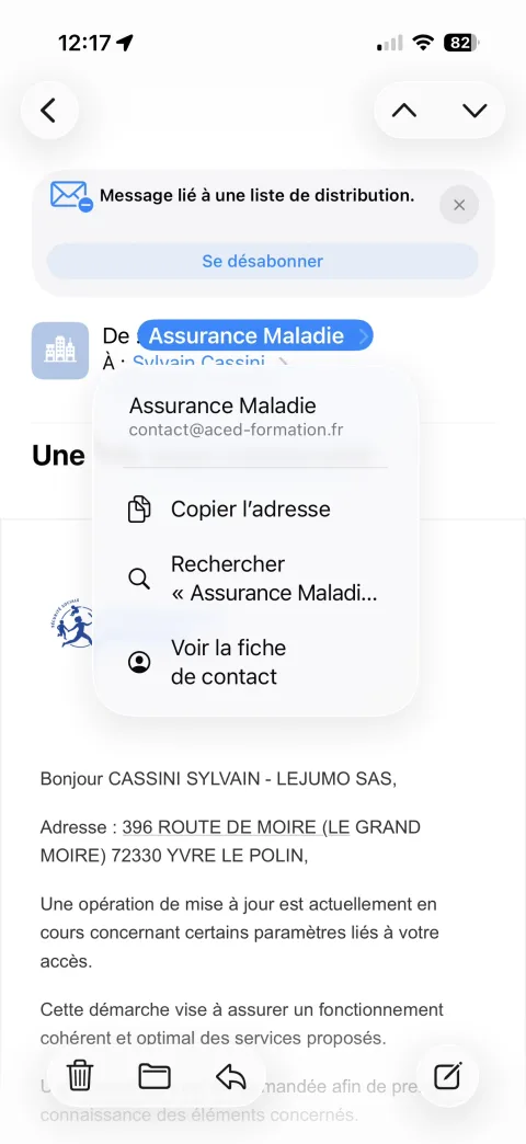 iPhone — appuyer sur le nom Assurance Maladie révèle l'adresse réelle contact@aced-formation.fr